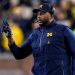 Sherrone Moore’s spouse Kelli helps ex-Michigan HC by way of alleged dishonest scandal amid firing and arrest